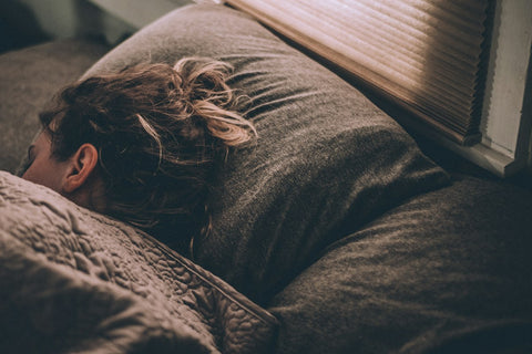 Woman sleeping peacefully — magnesium glycinate supports restful sleep and relaxation